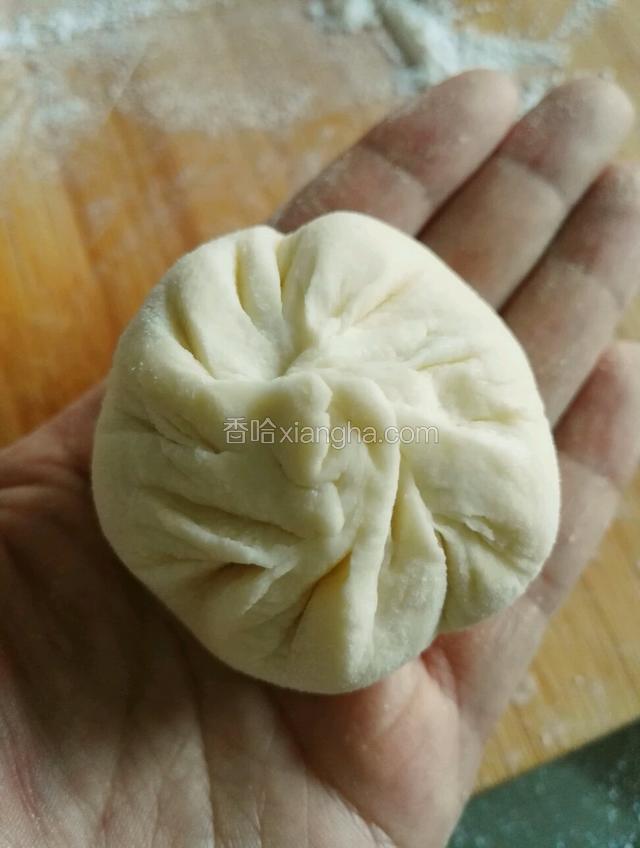 用包包子的手法包好收口朝下
