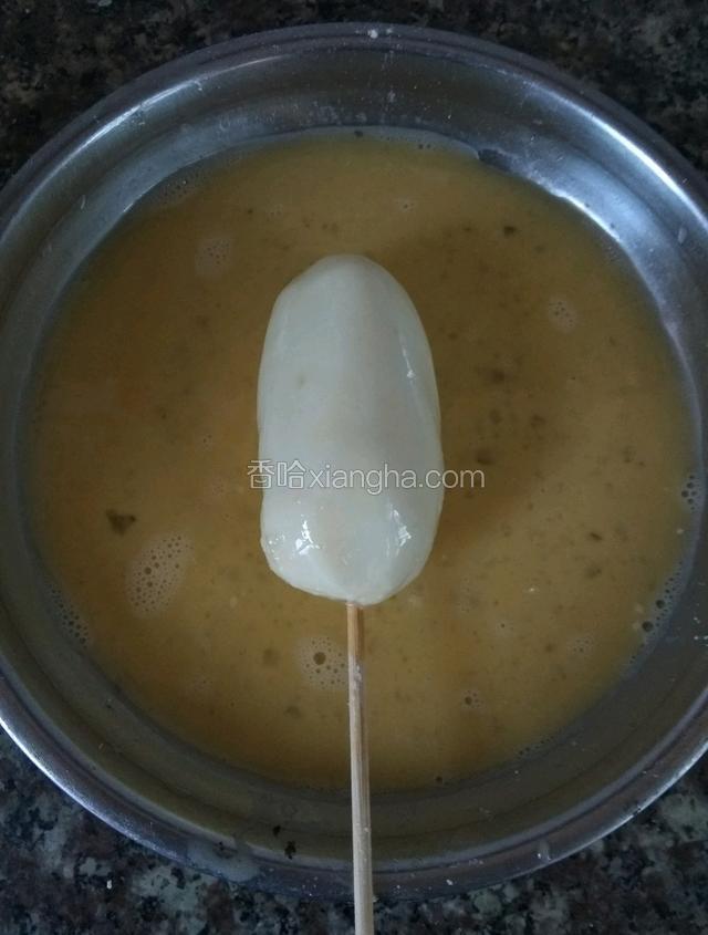 再裹上一层鸡蛋液