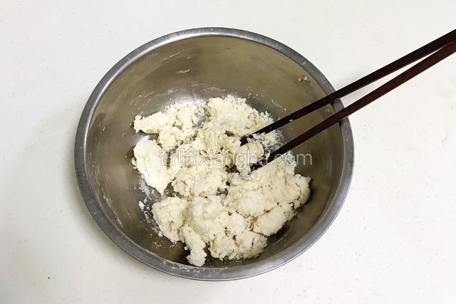 用筷子拌至棉絮状。