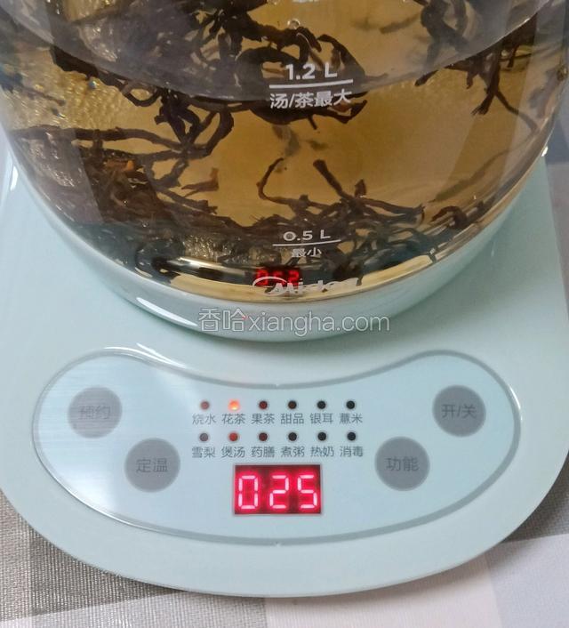 按花茶功能键，煮十分钟