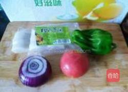 番茄烧年糕的做法图解1