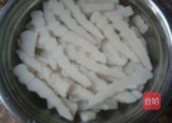 雪菜肉丝炒年糕的做法图解2