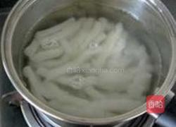 雪菜炒墨鱼的做法图解4