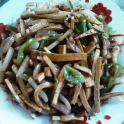 洋葱肉丝炒干子的做法[图]
