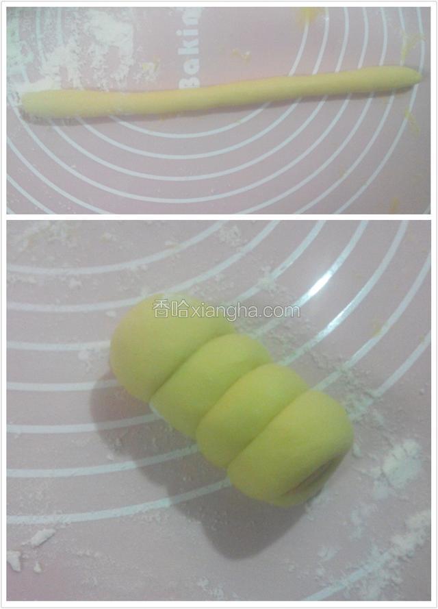 完成图6,开始做花卷,把面团分成适量小等分,搓成长条,把长条缠在火腿肠上,缠的时候,稍微拉紧些.