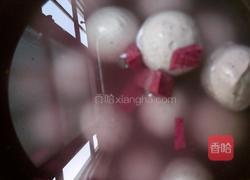 黑糯米芝麻馅汤圆煮紫薯甜酒鸡蛋的做法图解3