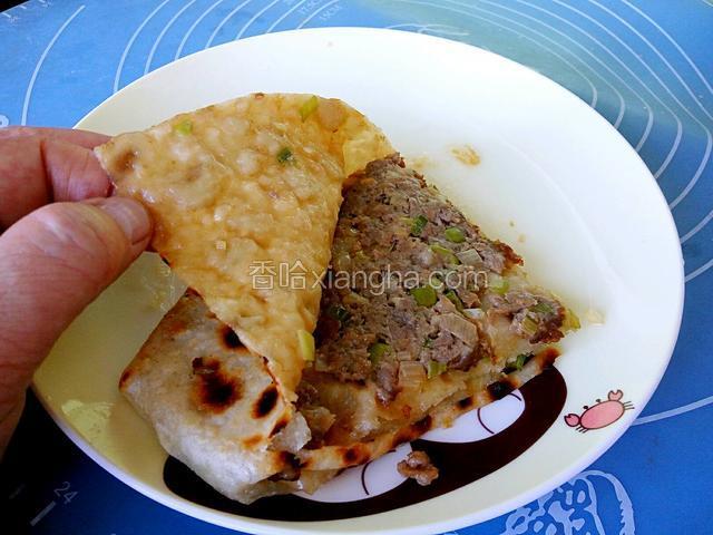 打开看外皮焦黄，层层肉香