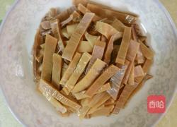 鱿鱼干菜心粒粥的做法图解2