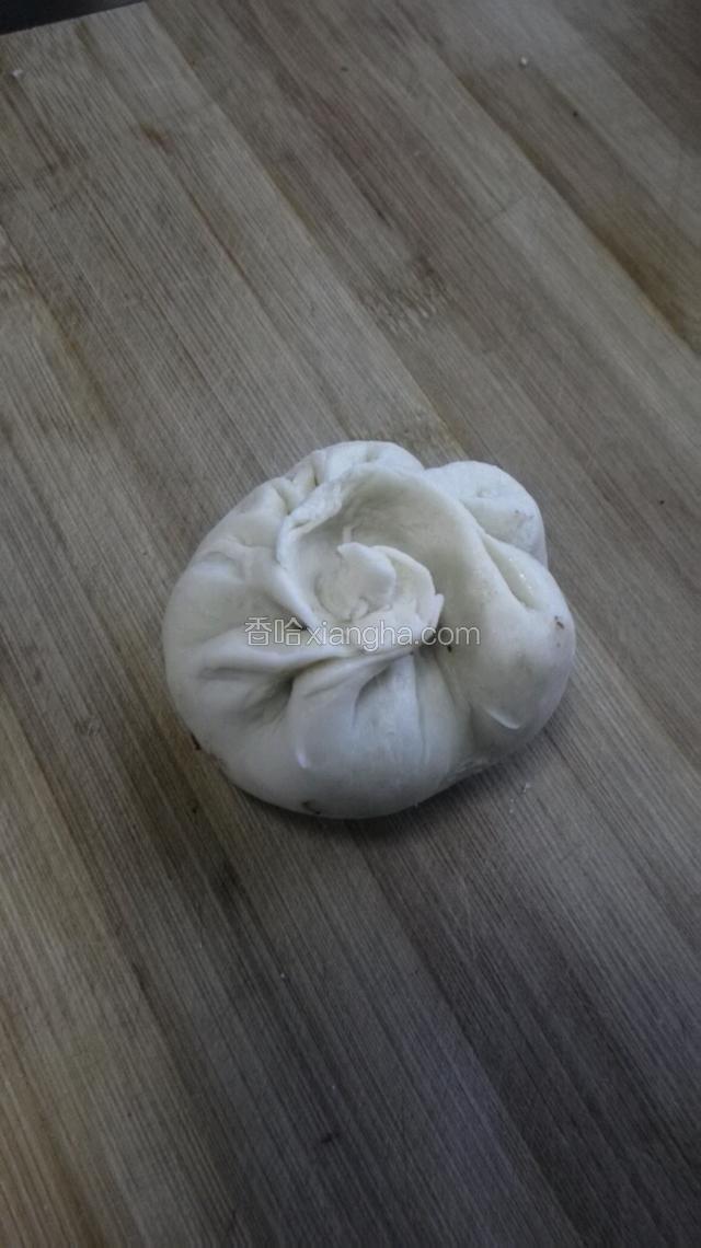 包好的样子。口一定捏紧。