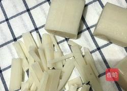 大蒜炒年糕的做法图解2