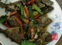 煎煮蓝子鱼的做法图解5