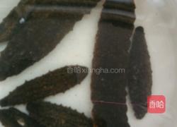 海参小米粥的做法图解3