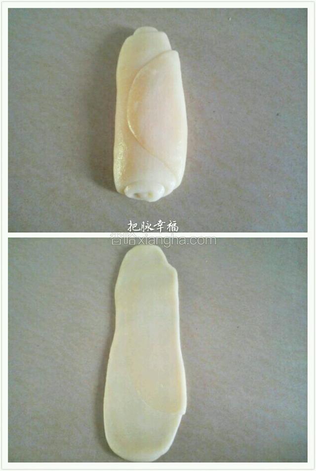 取一个松弛好的面卷稍微按压，重新擀成长椭圆形