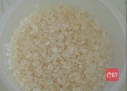 皮蛋火腿粥的做法图解2