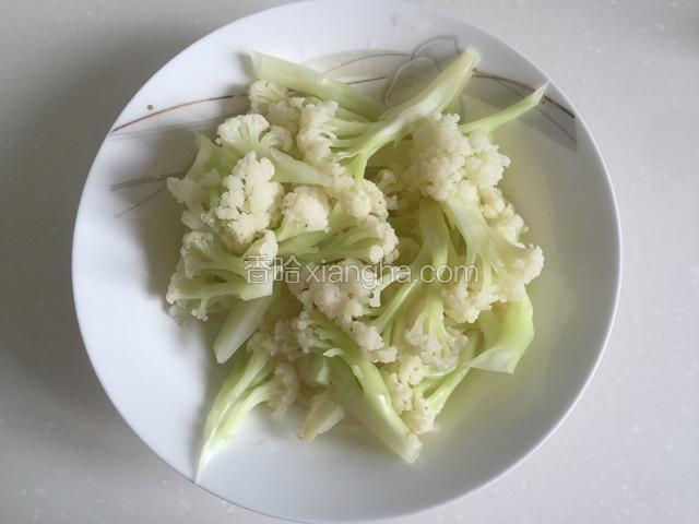捞出沥干水分。
