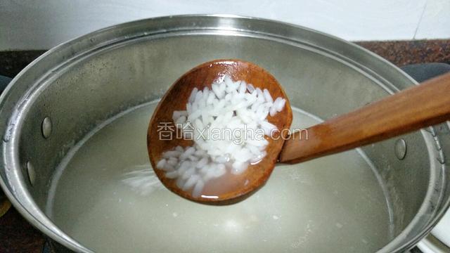 如图所示煮到大米七成熟