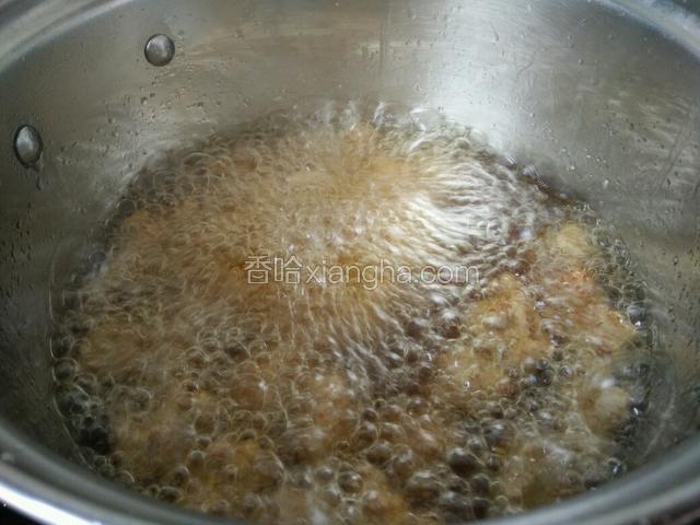 再放入热油中炸透
