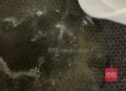 雪菜汁煮玉螺的做法图解4