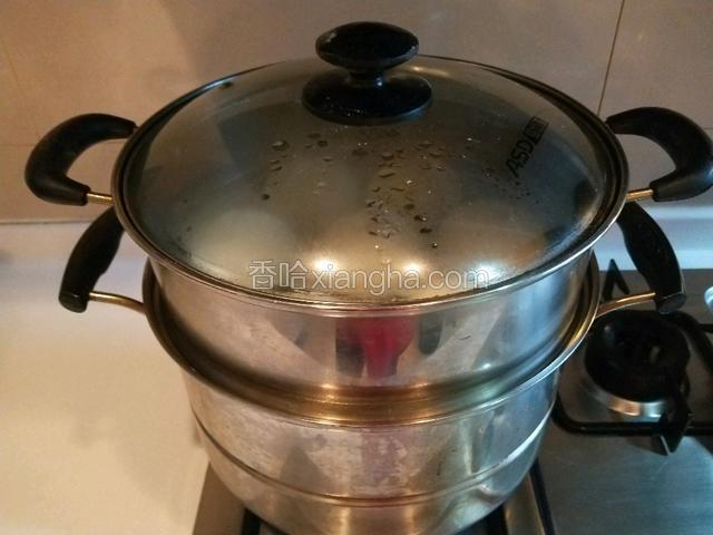 蒸好的5分钟后打开。