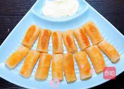 Illustration of how to make mini custard spring rolls 9